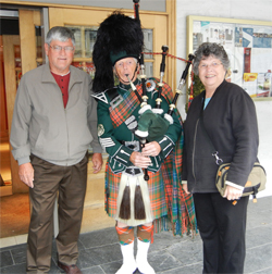 Henry and Barbara with a bagpiper